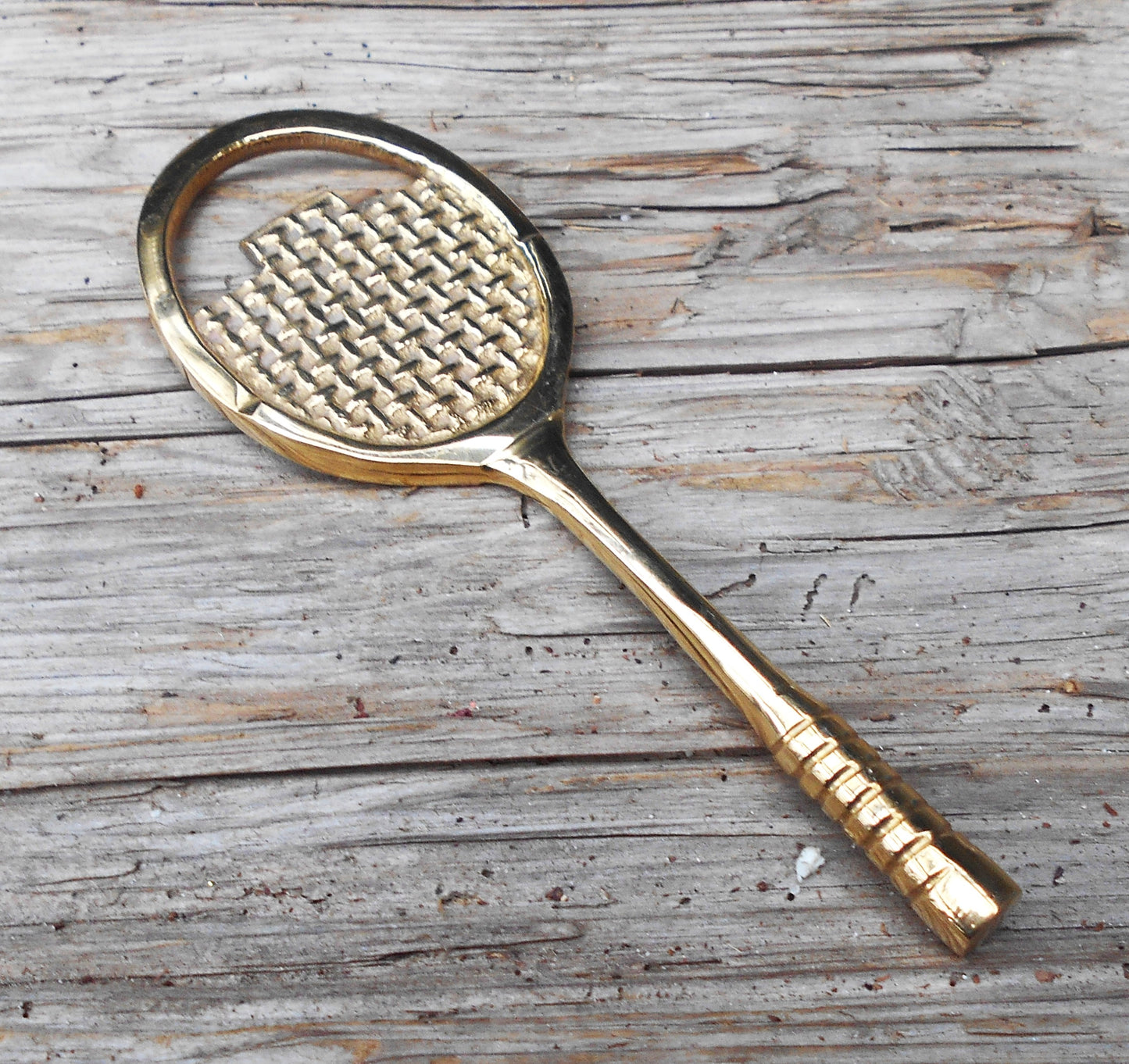 Flaschenöffner, Racket